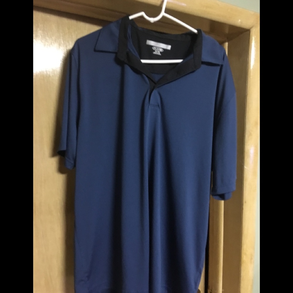 Greg Norman XL polo top. Play dry variety.